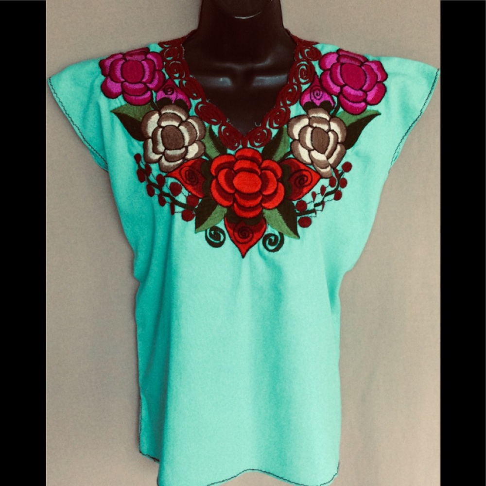 Beautiful blue blouse with flower design